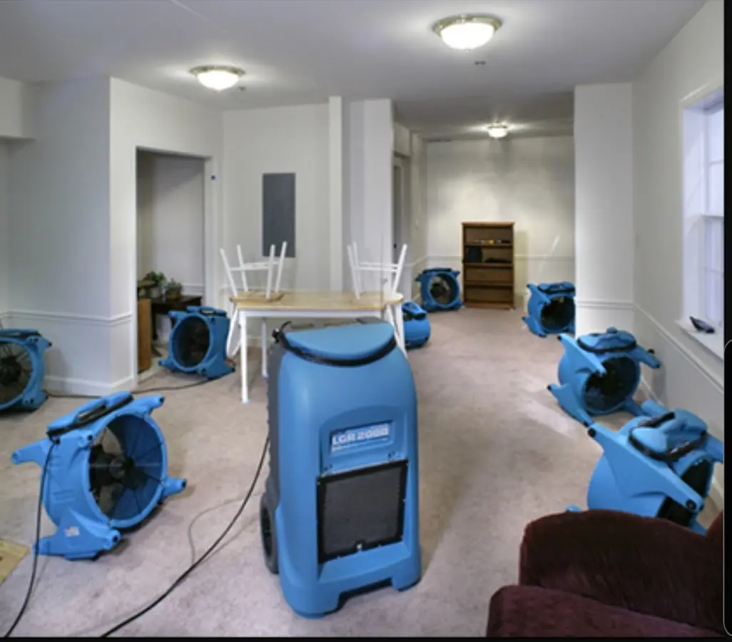 Air movers and dehumidifier setup for Water Damage Restoration in Deale